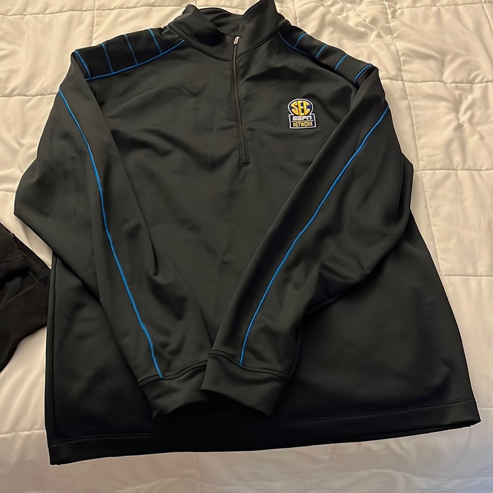 Black and blue Nike golf SEC network pullover